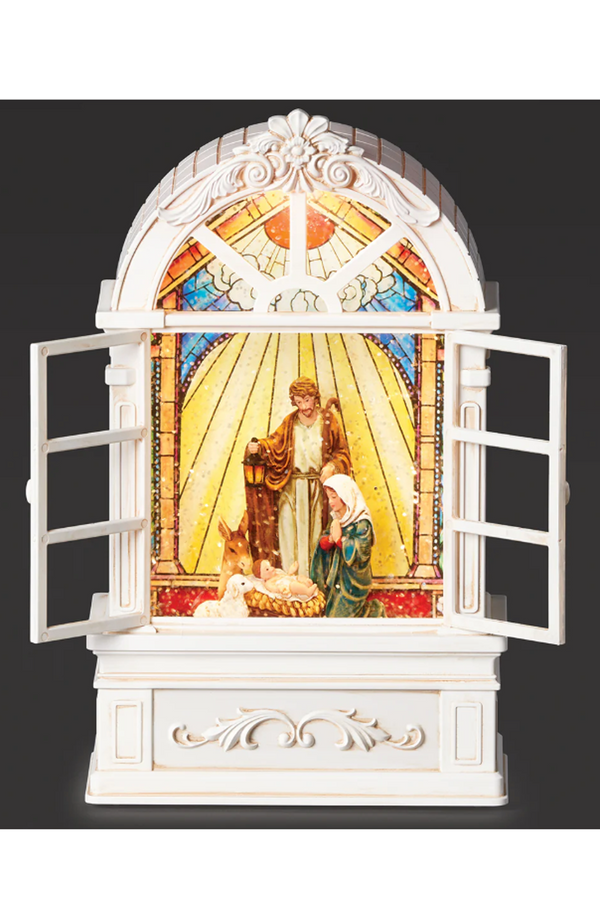 Lighted Holy Family Nativity in Stained Glass Church